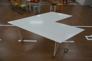 Global Village paper airplane table